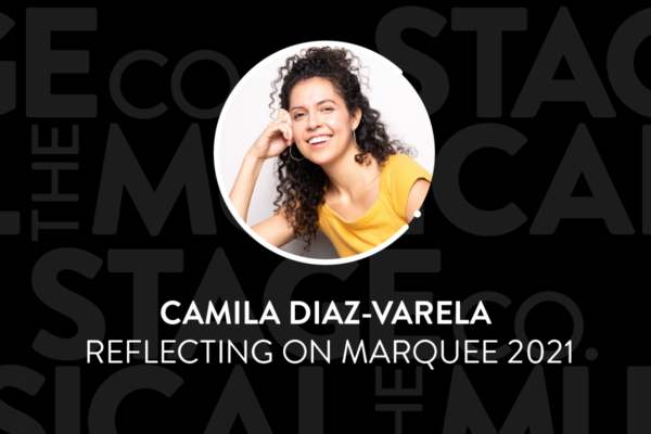 A black background has faded Musical Stage Company logos overlaid. Centered is a circular image of a headshot, with a white 'C' and '.' border. The headshot is Camila Diaz-Varela smiling widely into the camera, as they sit comfortably on the floor, while resting their head in their hand. They have long dark brown curly hair that spills from a messy updo, dark brown eyes, and are wearing a mango coloured shirt. Text underneath reads, “Camila Diaz-Varela / Reflecting on MARQUEE 2021.”