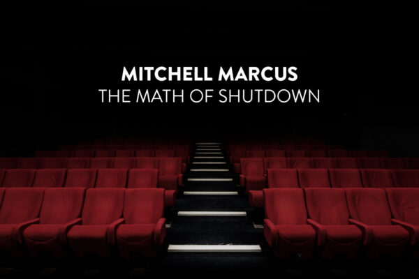 A dark lit theatre with rows of empty red seats and a centered aisle of stairs. Top-center is white text reading, "Mitchell Marcus / The Math of Shutdown."